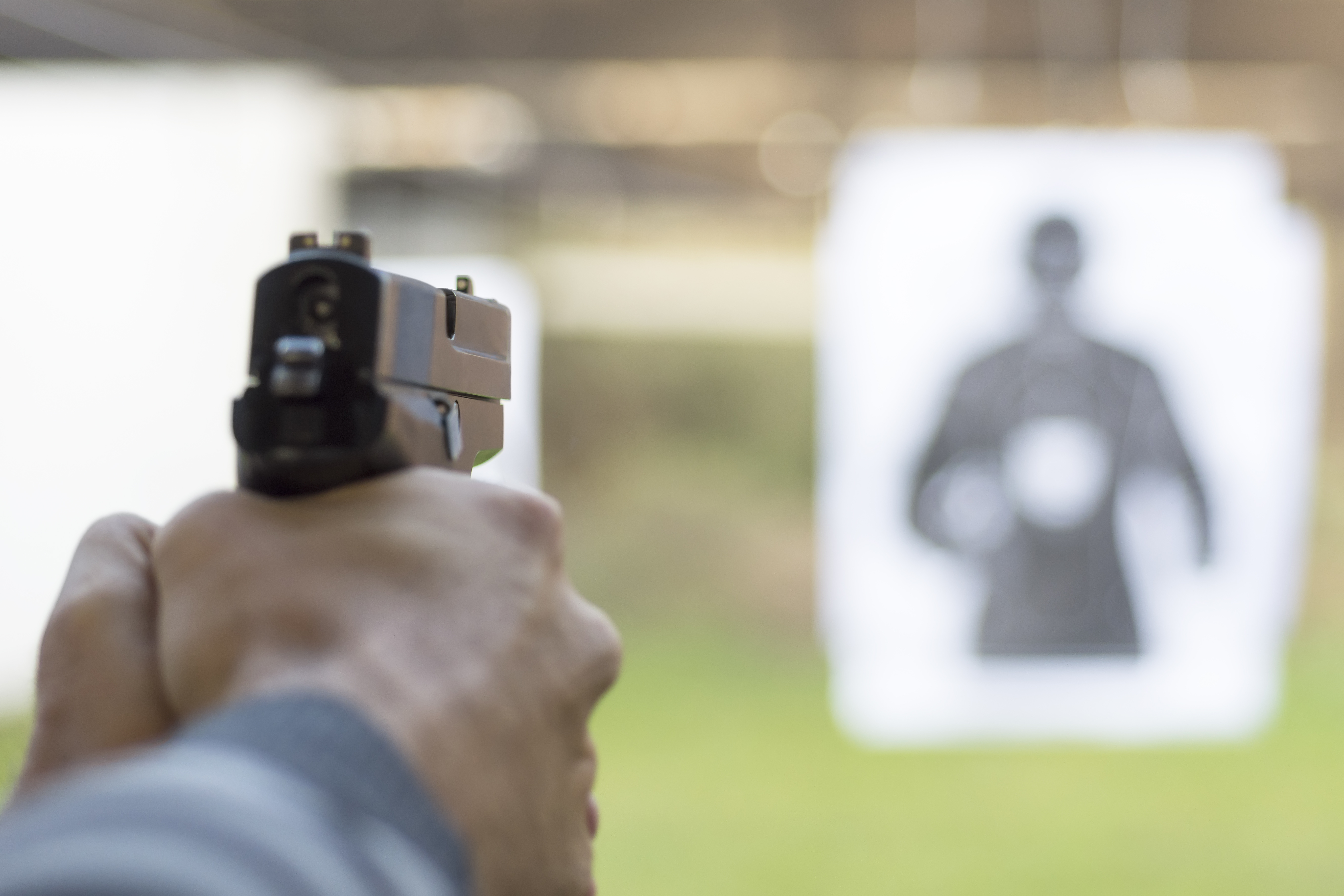 Firing Pistol at License To Carry practice target